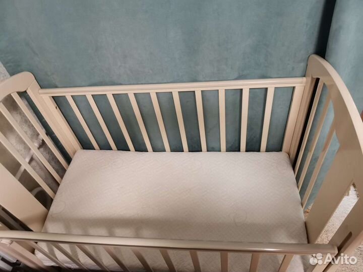 Детская кроватка можга с поперечным маятником