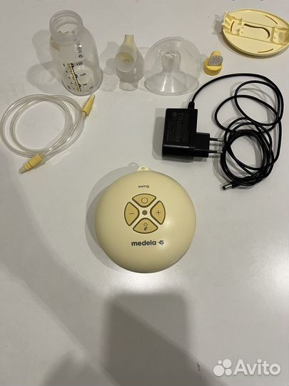Электрический молокоотсос medela swing