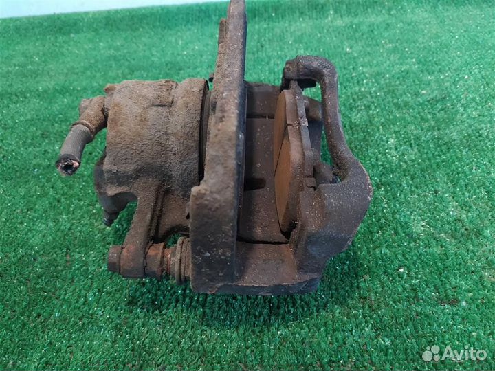 Суппорт тормозной передний левый Toyota RAV4 A30