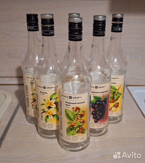 Пустые бутылки из под сиропа