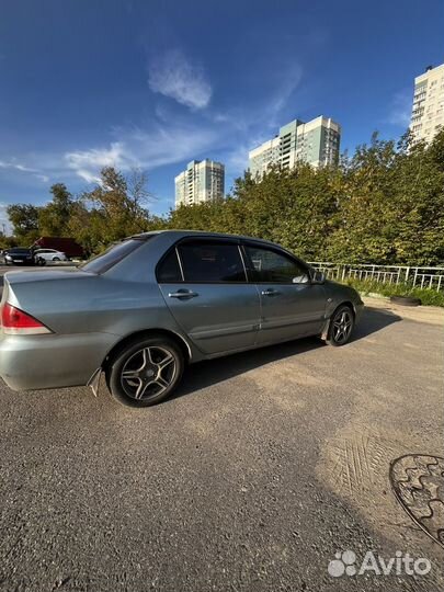 Mitsubishi Lancer 1.6 МТ, 2006, 197 000 км