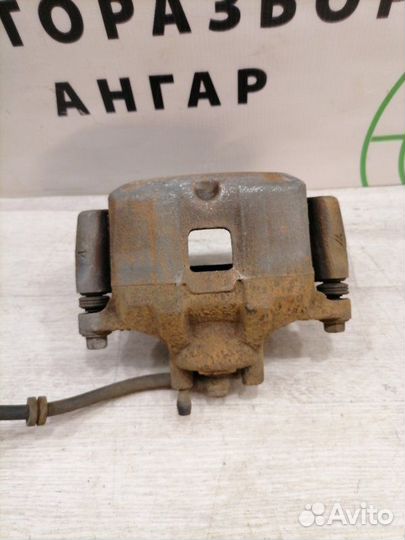 Суппорт передний левый Mitsubishi Lancer 10 CX2A