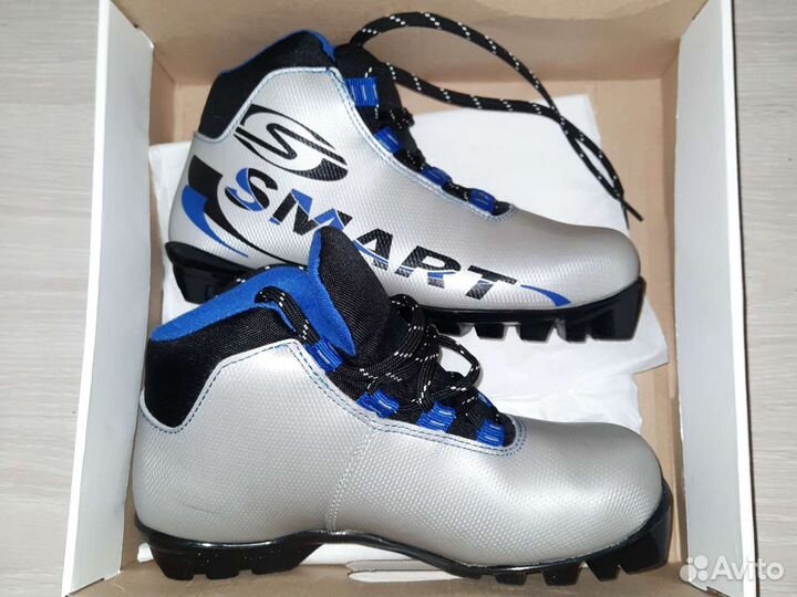 Лыжные ботинки и лыжи karhu новые