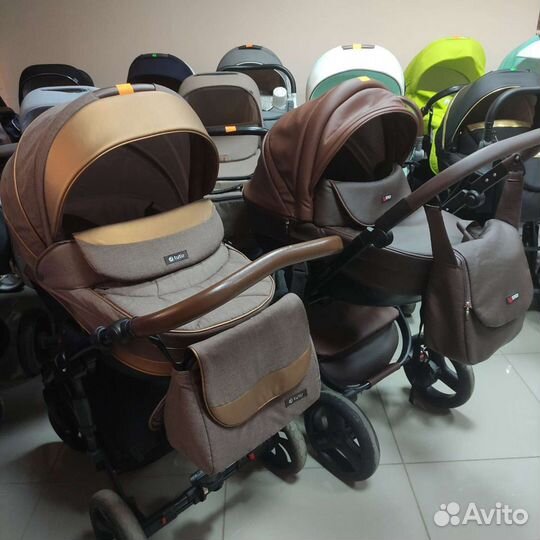 Коляска стильная шоколадного цвета