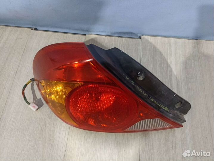 Фонарь левый Kia Spectra (Спектра)