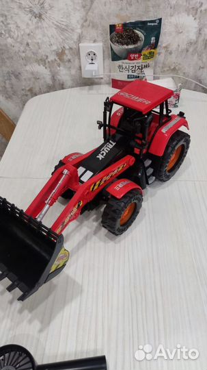 Детские игрушки трактор