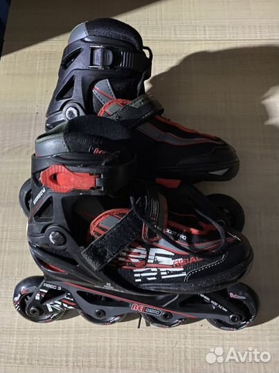 Роликовые коньки