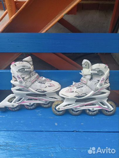 Коньки роликовые