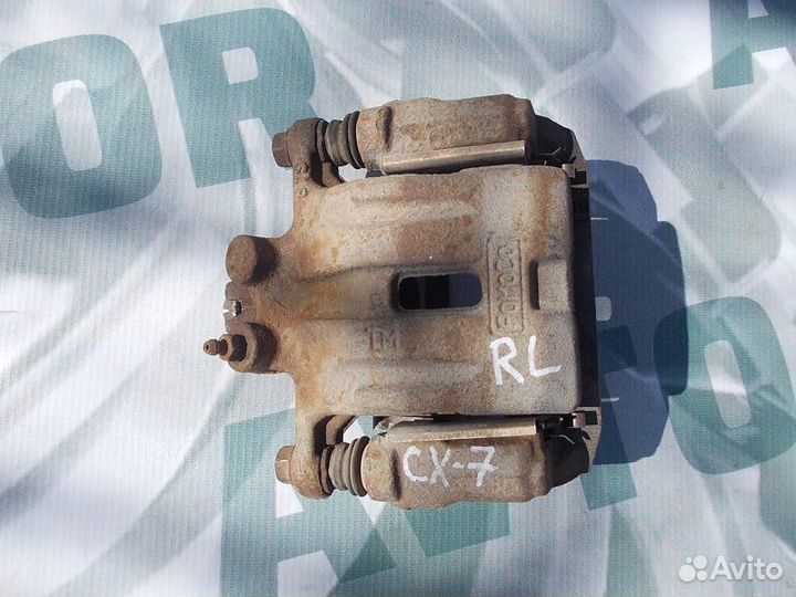 Суппорт тормозной задний левый Mazda Cx-7 2.3 2008