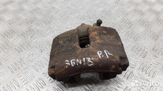 Суппорт тормозной передний правый volkswagen passa