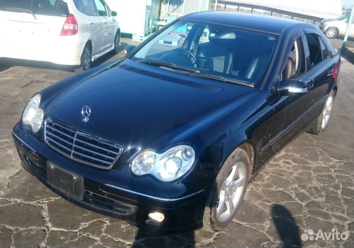 Датчик положения кузова задний Mercedes-Benz C180