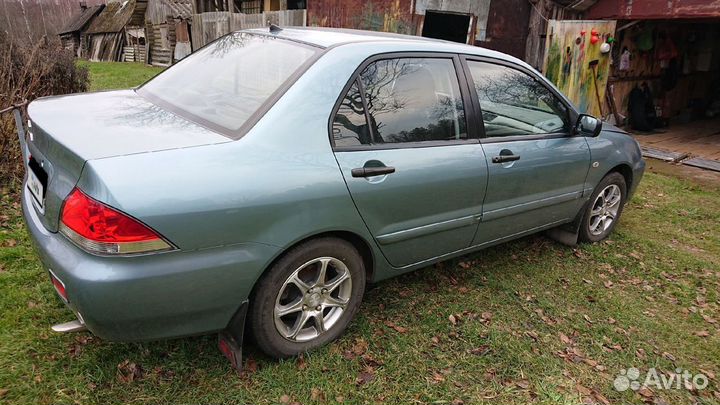 Mitsubishi Lancer 1.3 МТ, 2006, 73 245 км