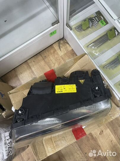 Фара ксеноновая левая Bmw E38