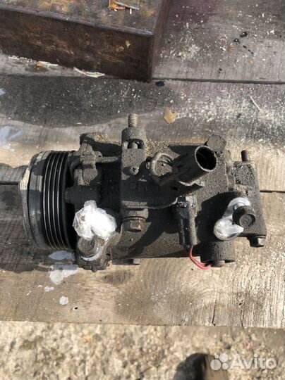 Компрессор кондиционера lancer 10