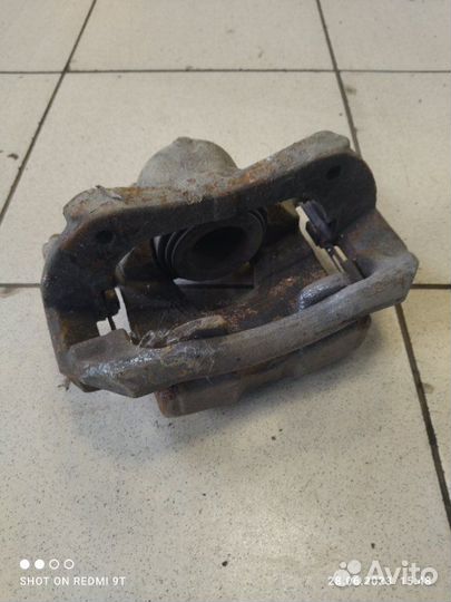 Суппорт тормозной передний правый Chevrolet Cruze
