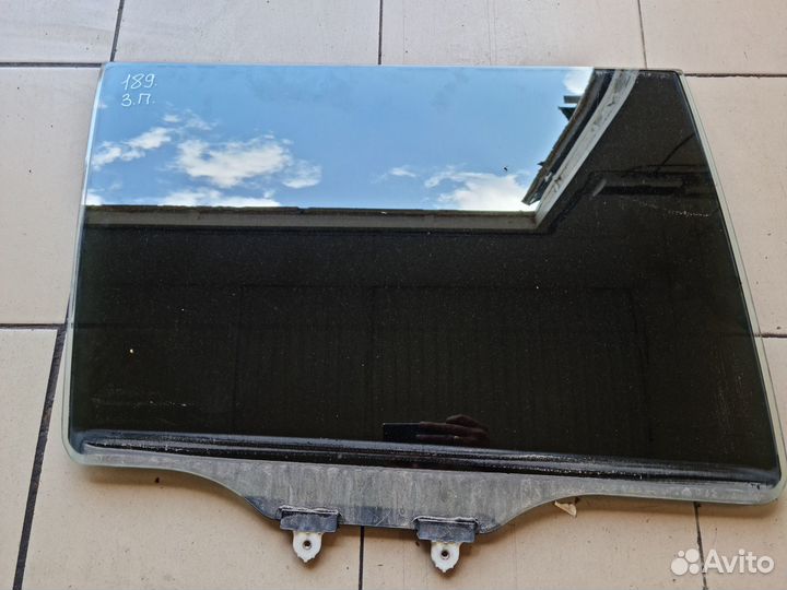 Стекло боковое Mitsubishi Lancer IX