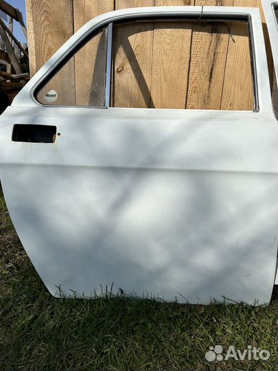 Двери на волгу Газ 3110
