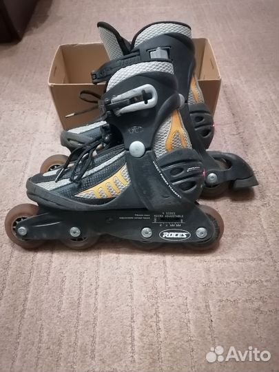 Роликовые коньки