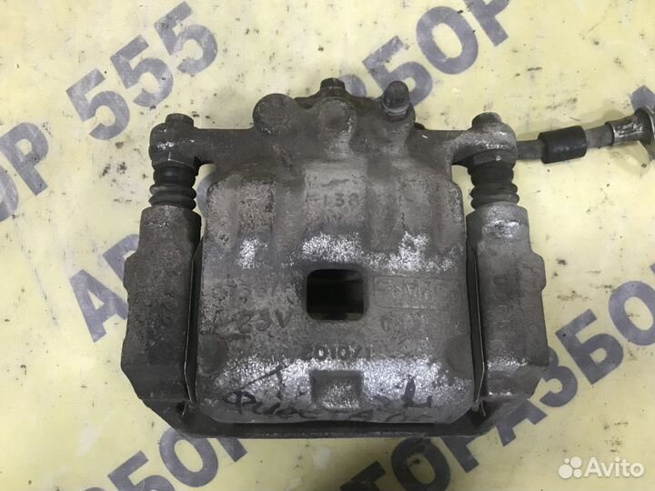 Суппорт тормозной передний левый Ford Fiesta