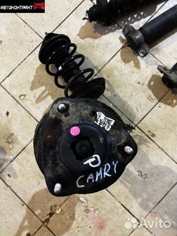 Стойка передняя левая Тойота Камри 70 3.5 литра