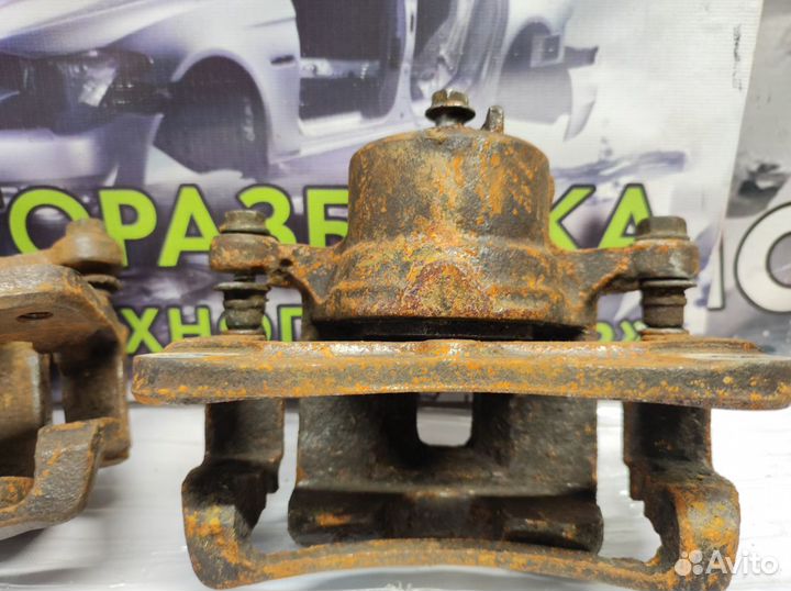 Суппорт передний Nissan Almera N15