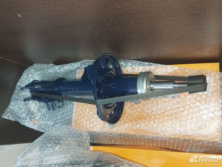 Амортизатор передний Opel Corsa D