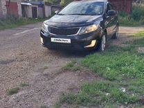 Kia Rio 1.4 MT, 2012, 202 000 км, с пробегом, цена 830 000 руб.