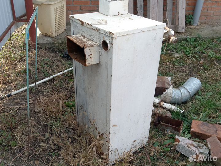 Котёл, может работать на газу и твёрдом топливе