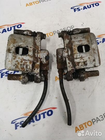 Задние тормозные суппорта Митсубиси Лансер 9