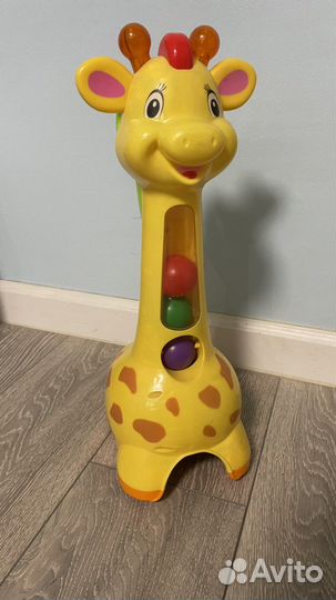 Игрушка жираф развивающая