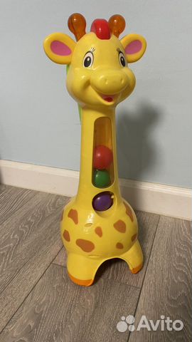 Игрушка жираф развивающая