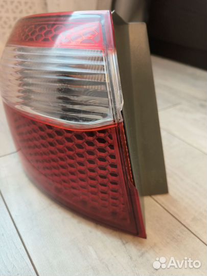 Фонарь задний левый kia rio 3 седан 924014x500