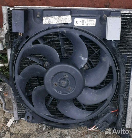 Радиатор вентилятор кондиционера Опель Астра Н