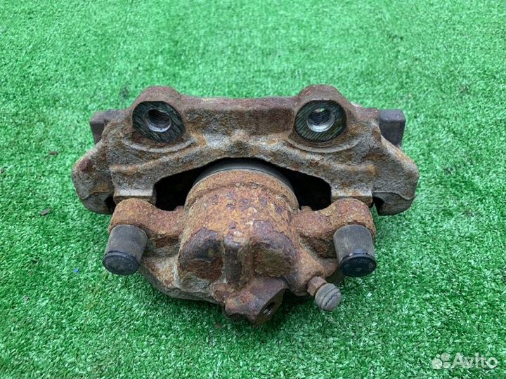 Суппорт тормозной левый Ford Kuga легковой