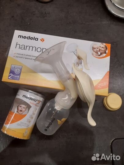 Молокоотсос medela ручной+смартсоска calma+пакеты