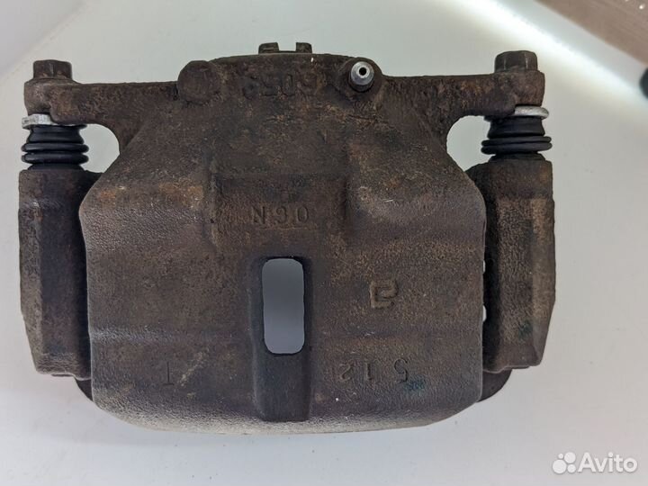 Суппорт тормозной передний Nissan Qashqai J10 рест