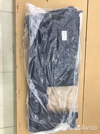 Обшивка багажника X7 (левая)