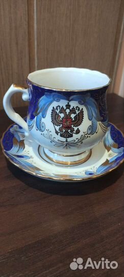 Фарфоровая кружка с блюдцем