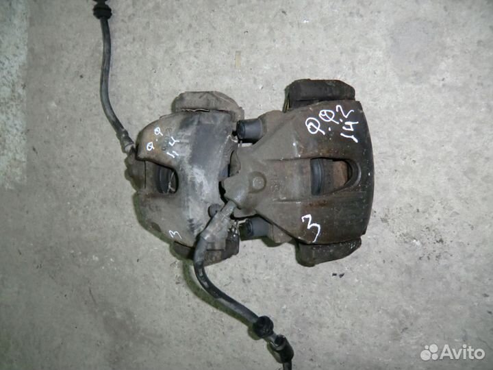 Суппорт передний правый левый Форд Фокус 2