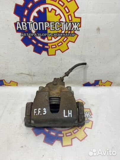 Суппорт тормозной передний левый Ford Focus 3 iqdb