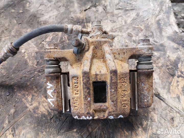 Суппорт задний левый шевроле лачетти