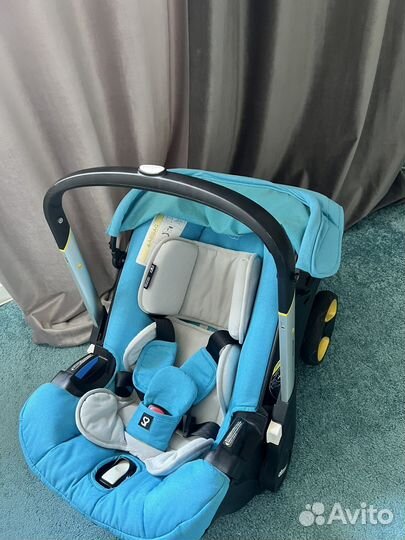 Коляска автокресло doona с базой isofix