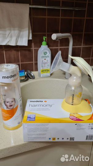 Молокоотсос medela ручной и бутылочка