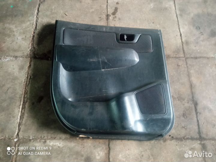 Обшивка двери задняя левая Toyota Hilux 7