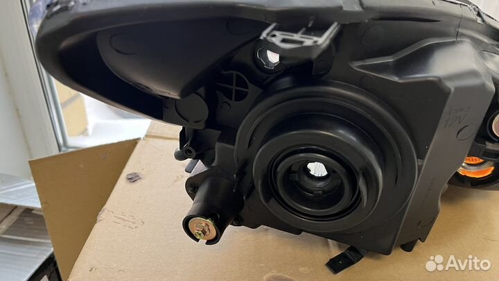 Фара mitsubishi lancer 03-07