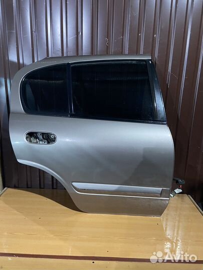 Задняя правая дверь на ниссан альмера н16