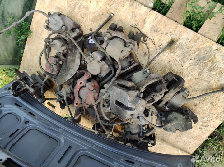 Суппорт тормозной передний задний BMW E39