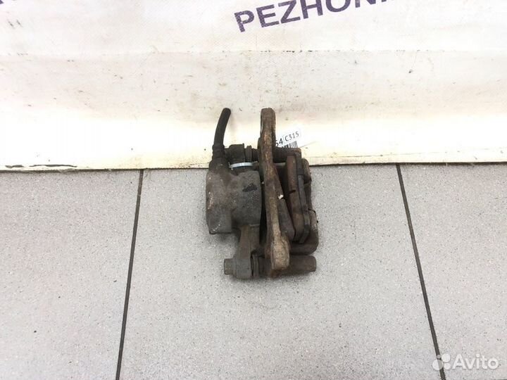 Суппорт тормозной задний левый Citroen C-Crosser