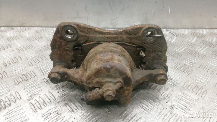 Суппорт передний левый Kia Ceed 2010