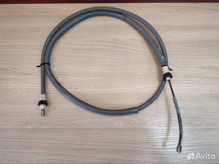 Трос стояночного тормоза Renault Logan